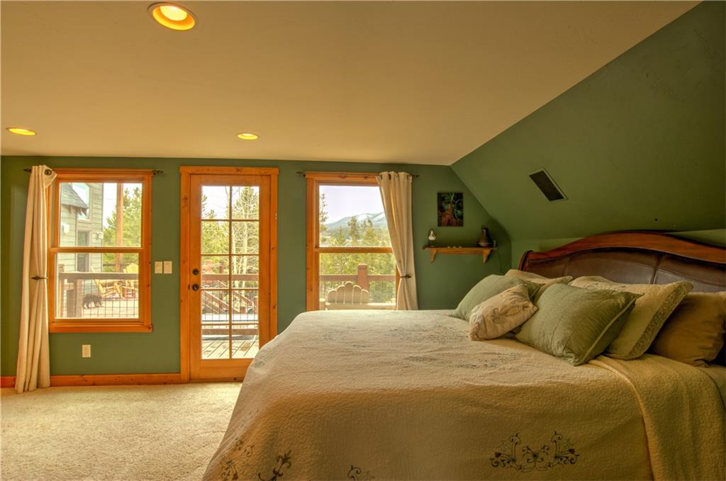 89 N Road Silverthorne, CO 80498 - Photo 10 of 35 a bedroom with a bed and a large window