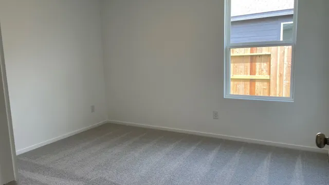 a view of a window in an empty room