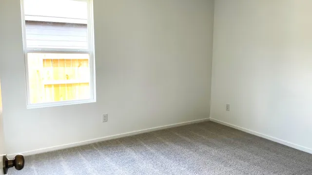 an empty room with a window