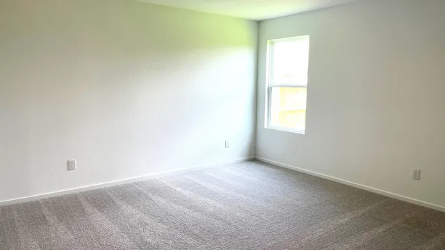 an empty room with a window