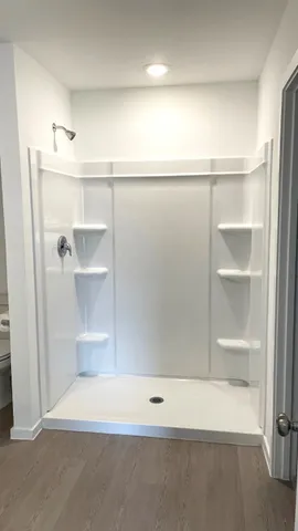 a view of an empty walk in closet