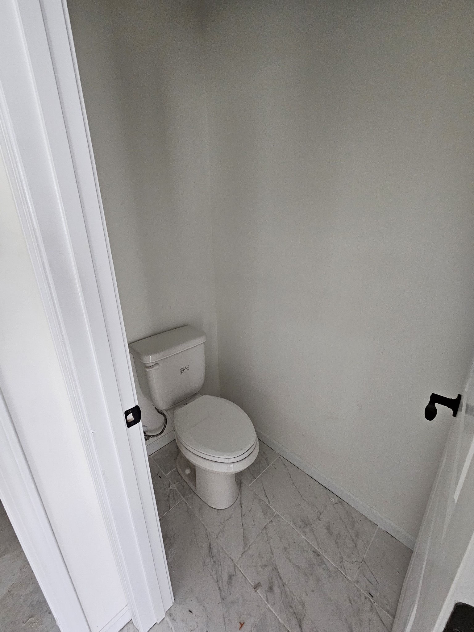 29 North Ballard Road Manchester, TN 37355 - Photo 18 of 24 a white toilet sitting next to a sink