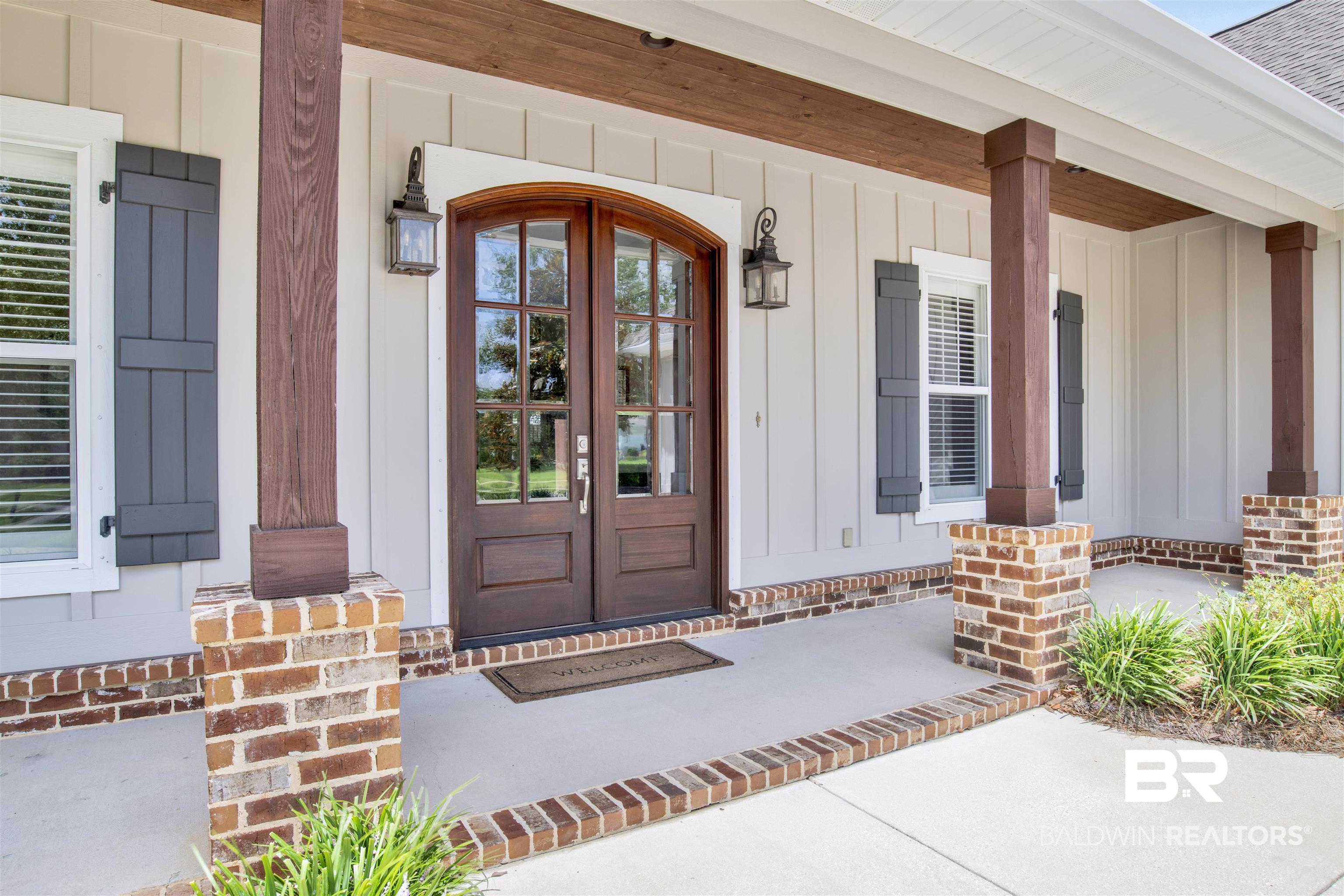 131 Sedgefield Avenue Fairhope, AL 36532 - Photo 6 of 50 Doorway to property featuring a porch