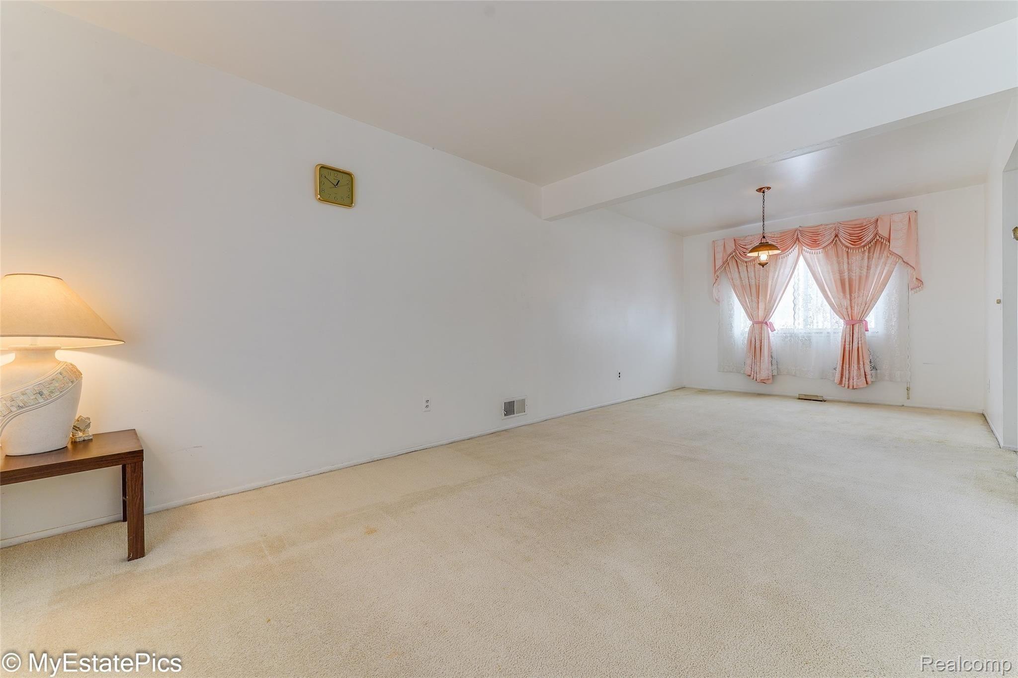 7434 Kingsbridge Road Canton, MI 48187 - Photo 9 of 36 CA-04 Living01 - 7434 kingsbridge canton.jpg
