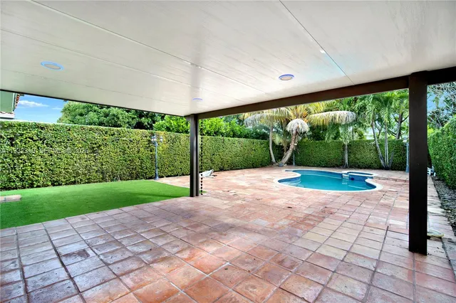a view of a porch with a backyard