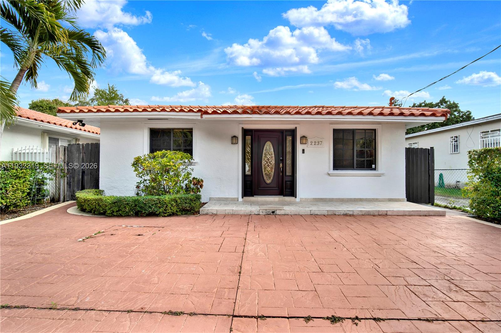 2237 Southwest 63rd Avenue Miami, FL 33155 - Photo 4 of 28 a view of a house with a patio
