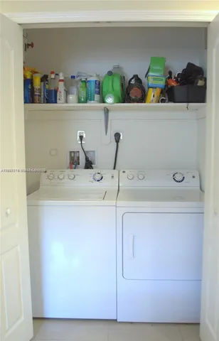 a bathroom with a sink and cabinets