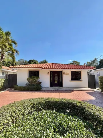 a view of a house with a patio