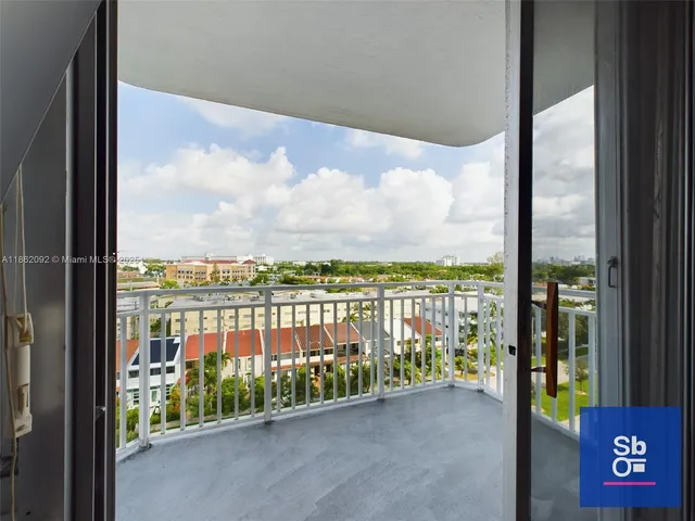 a view of a balcony with city view