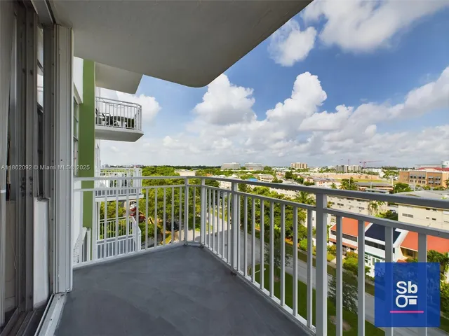 a view of a balcony with city
