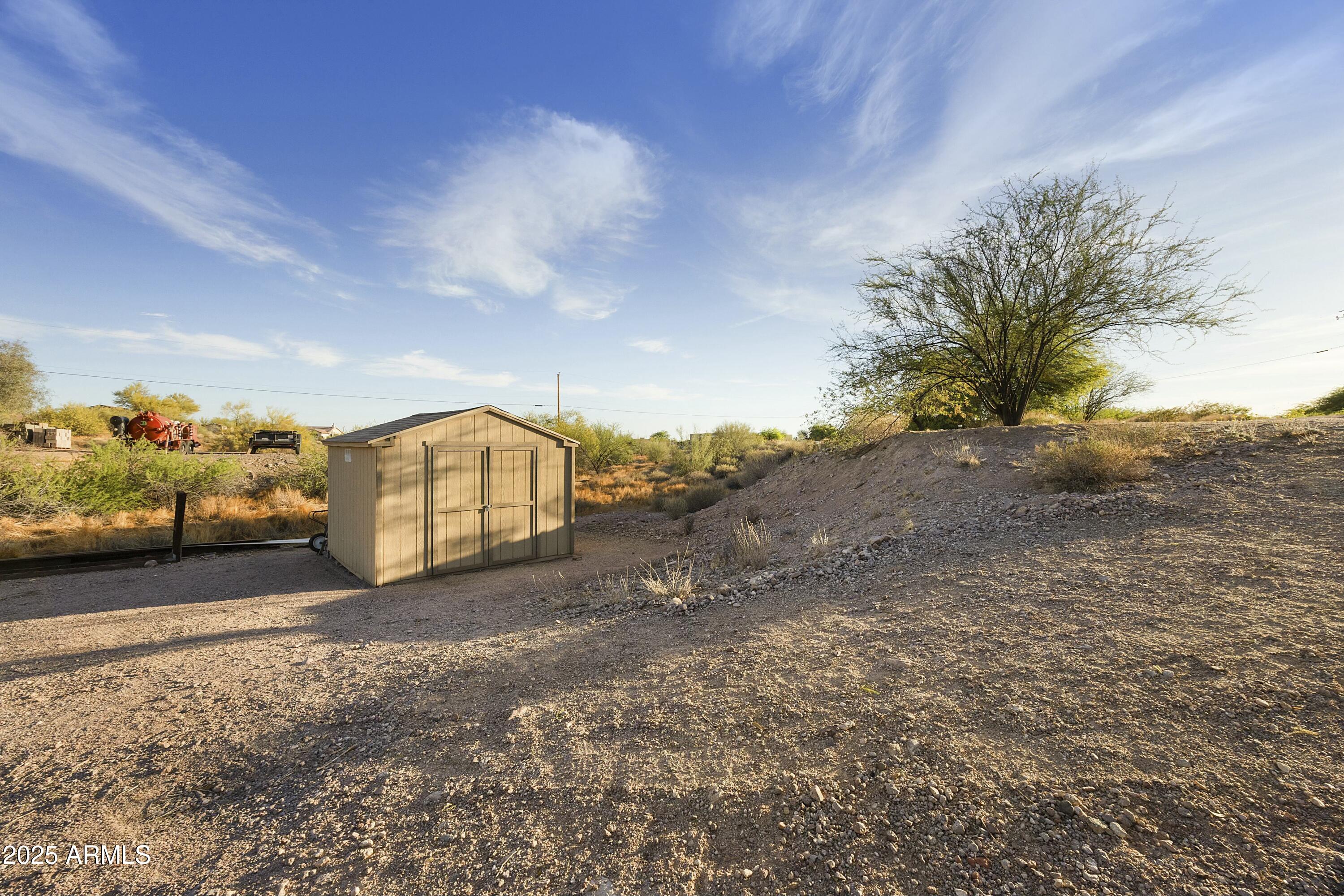 515 South Roadrunner Road Apache Junction, AZ 85119 - Photo 1 of 1 a view of a town with large trees