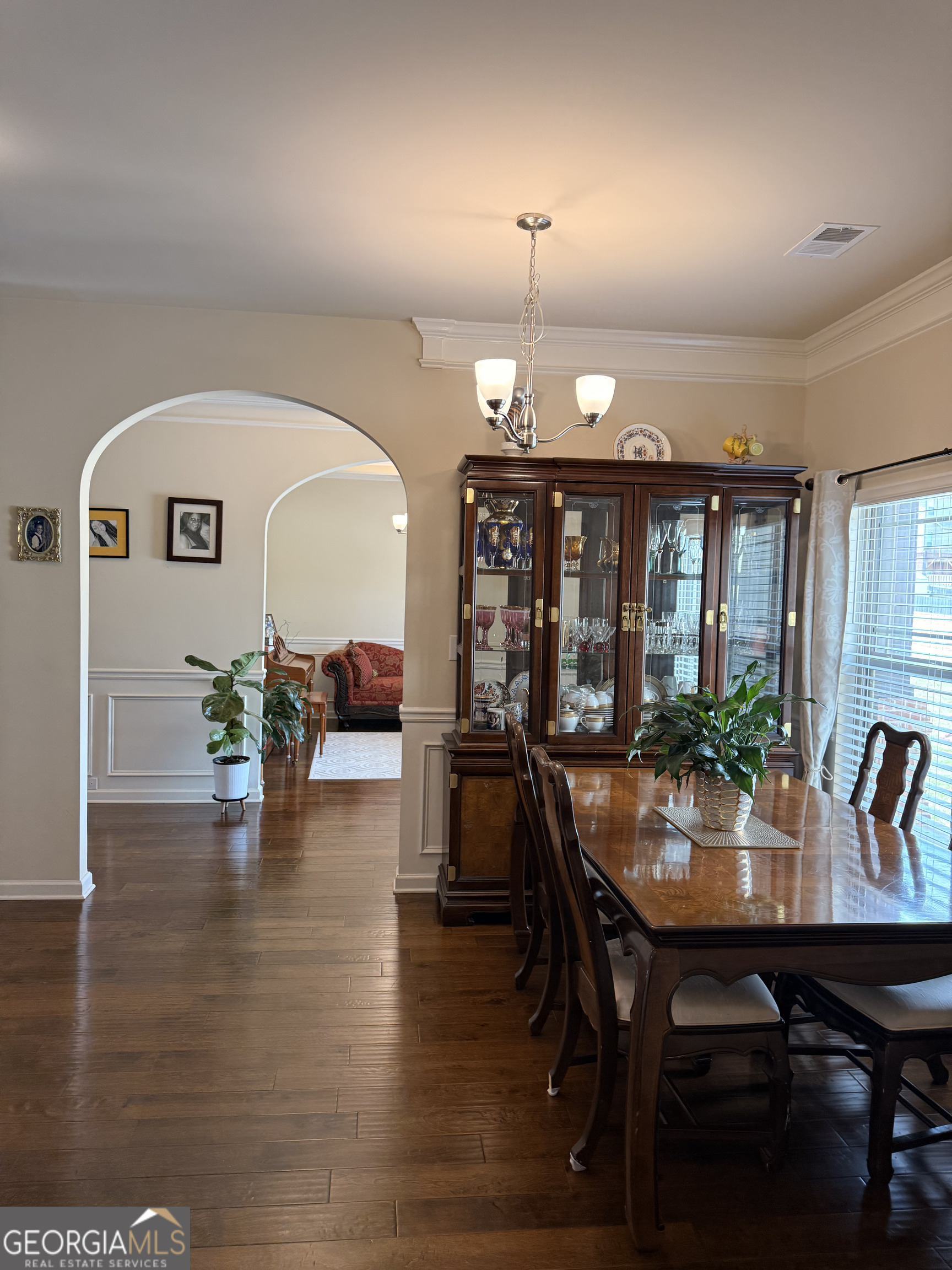260 Silver Ridge Road Covington, GA 30016 - Photo 15 of 35 a view of a dining room with furniture window and wooden floor