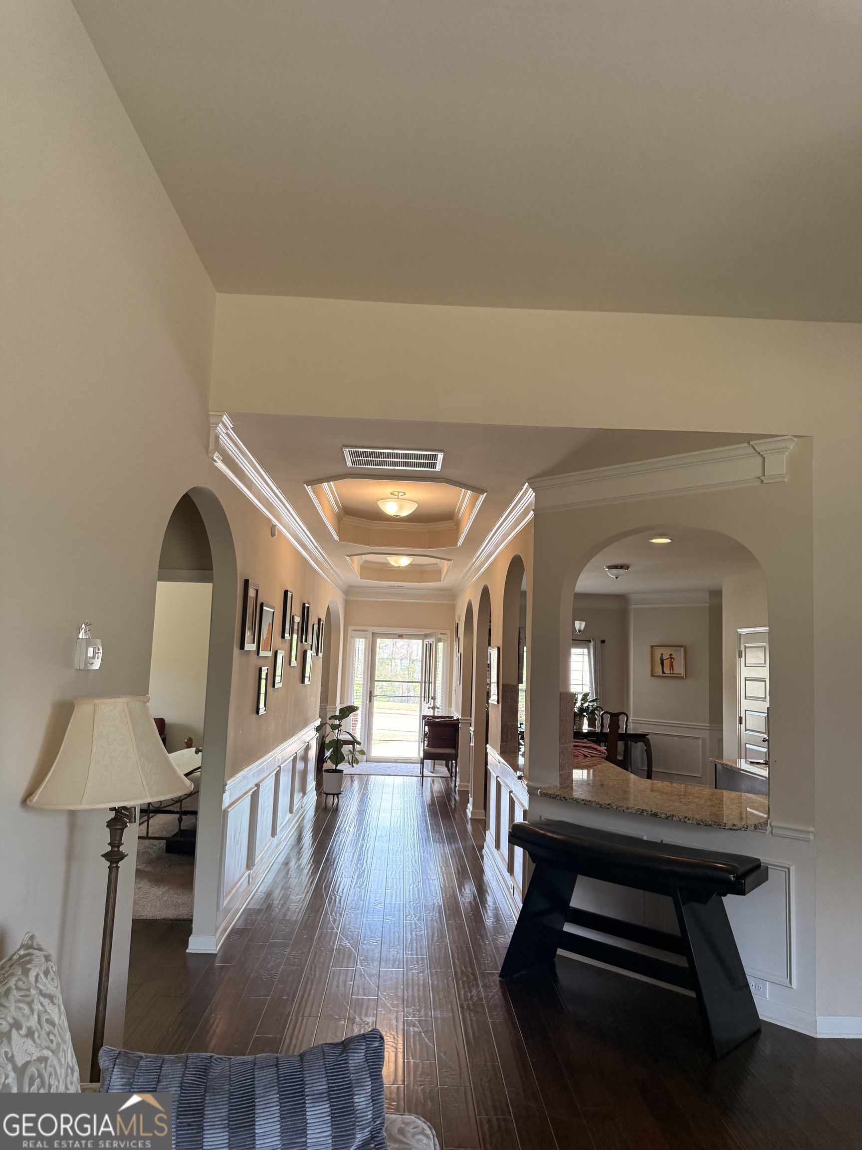 260 Silver Ridge Road Covington, GA 30016 - Photo 16 of 35 a lobby with furniture and wooden floor