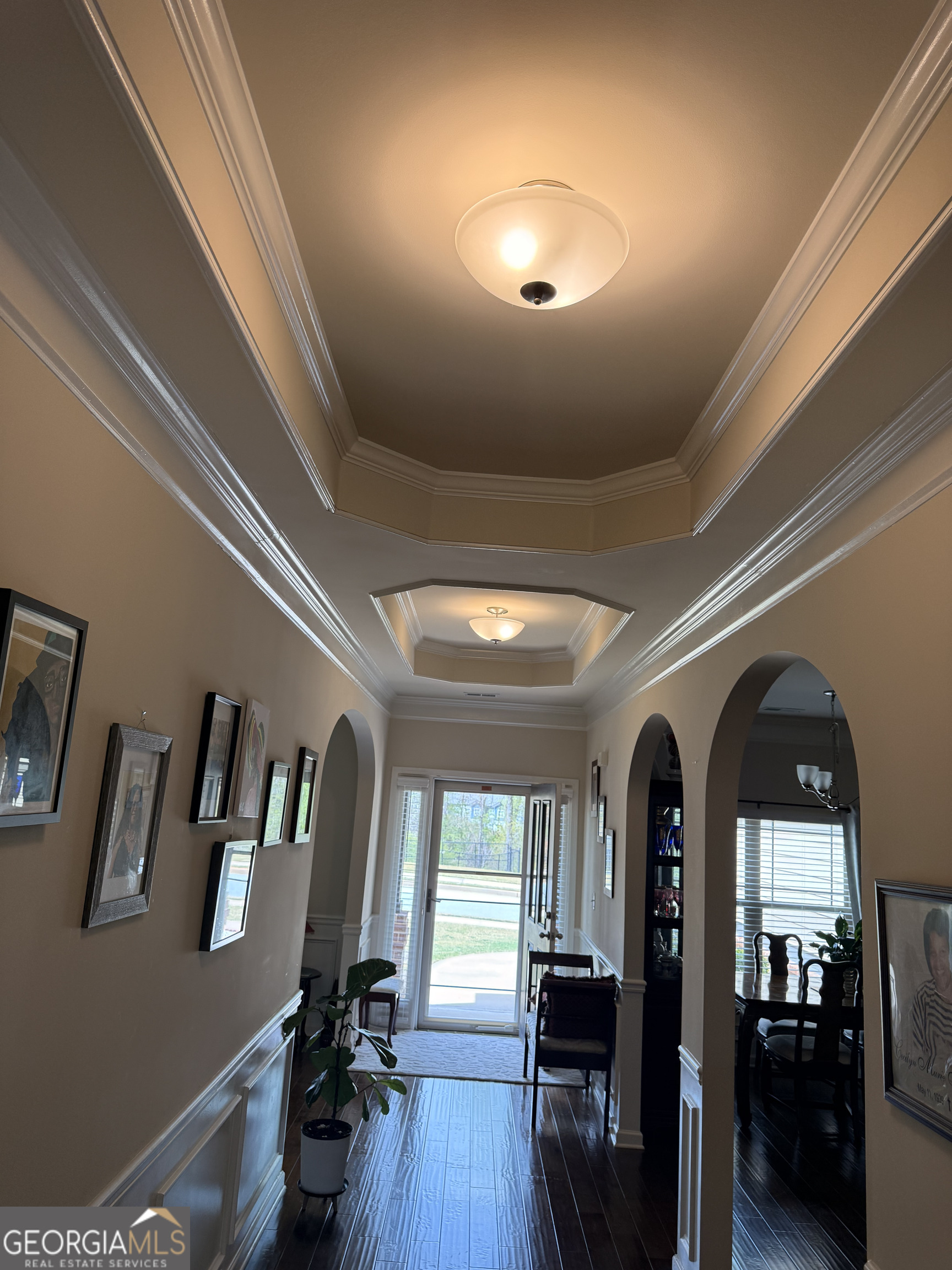 260 Silver Ridge Road Covington, GA 30016 - Photo 19 of 35 a view of hall way with furniture and wooden floor