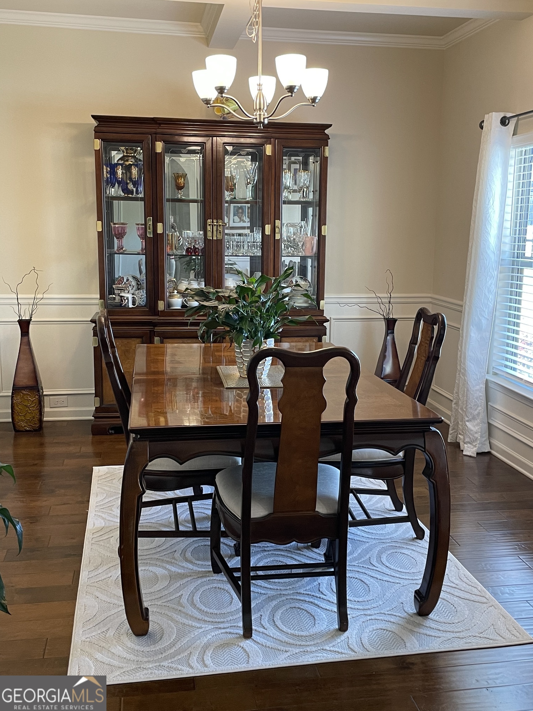 260 Silver Ridge Road Covington, GA 30016 - Photo 22 of 35 a view of a dining room with furniture window and wooden floor