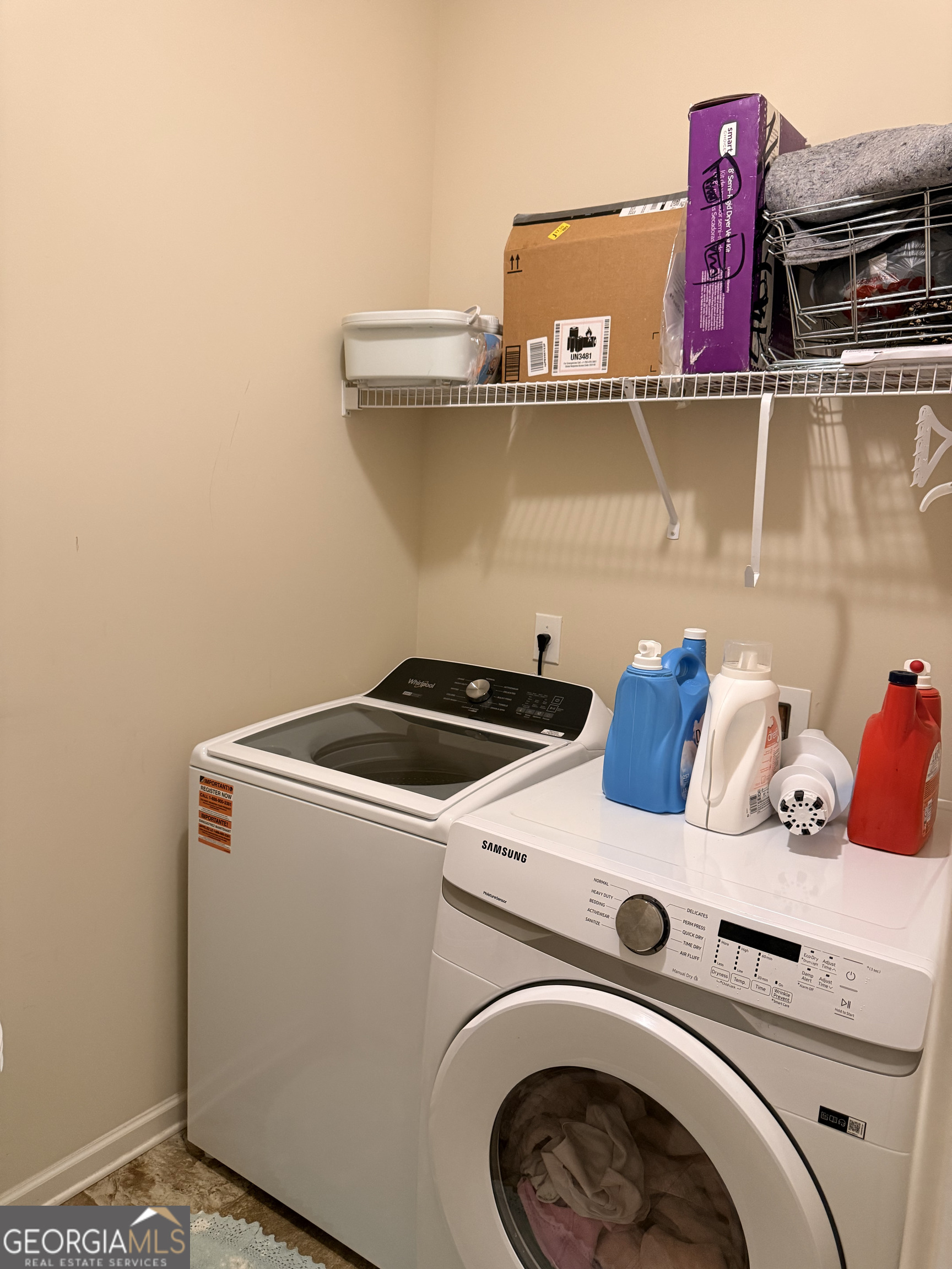 260 Silver Ridge Road Covington, GA 30016 - Photo 27 of 35 a utility room with dryer and washer