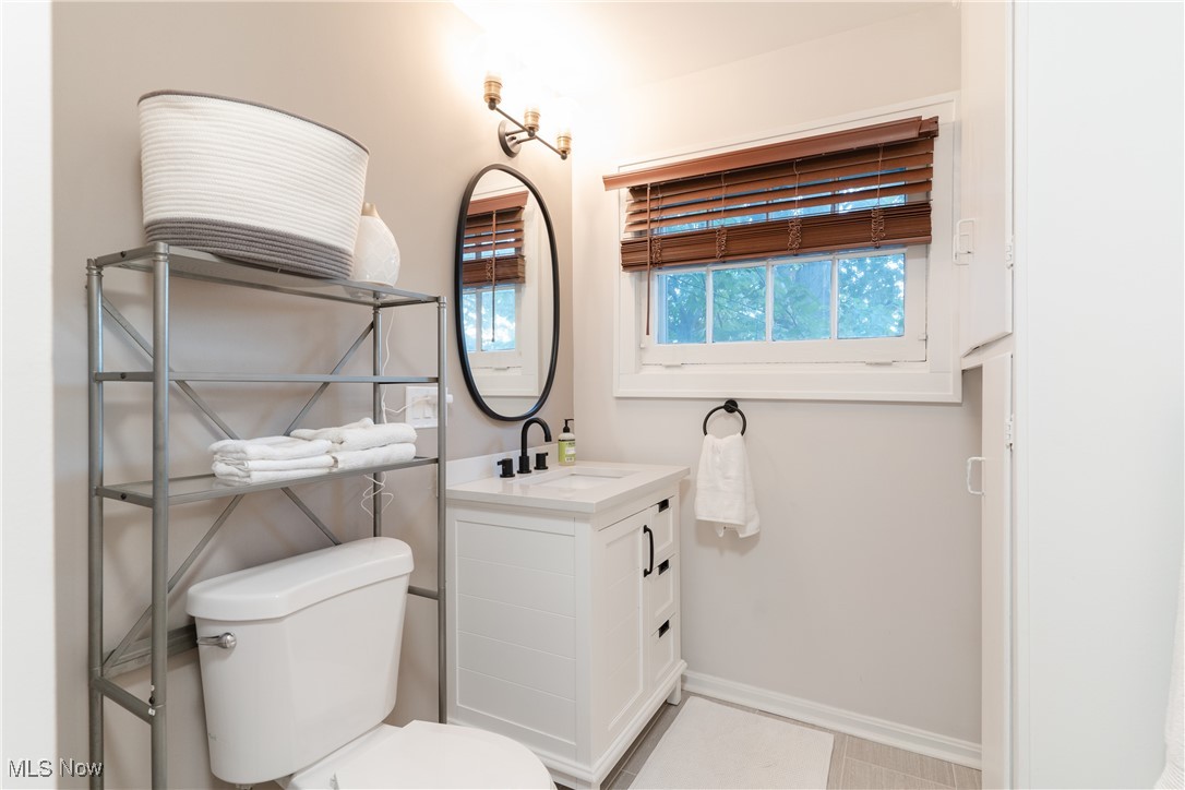 2890 Huntington Road Cleveland, OH 44120 - Photo 26 of 41 Bathroom with plenty of natural light, vanity, and toilet