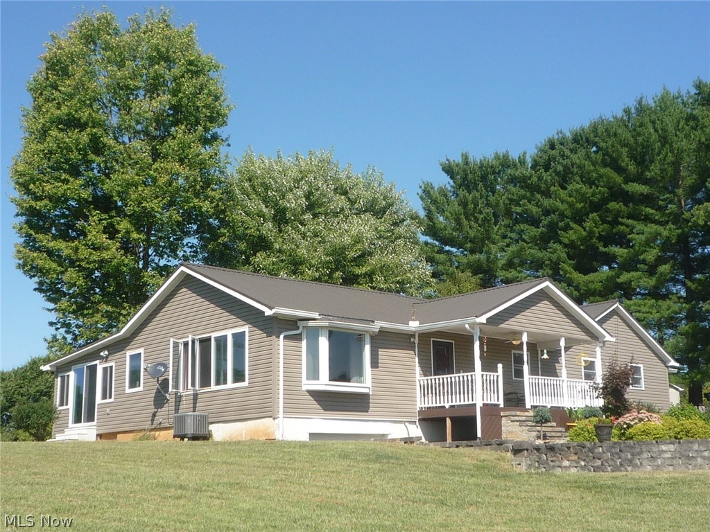 1385 Burnfield Road, Little Hocking Ohio. Fantastic spacious 3 or 4 Bedroom, 3 full bath home on 2.2 acres.
It's like a new house. All new in 2018: Heat pump, metal roof, siding, hot water tank, water softener, most windows, porch and kitchen counters.