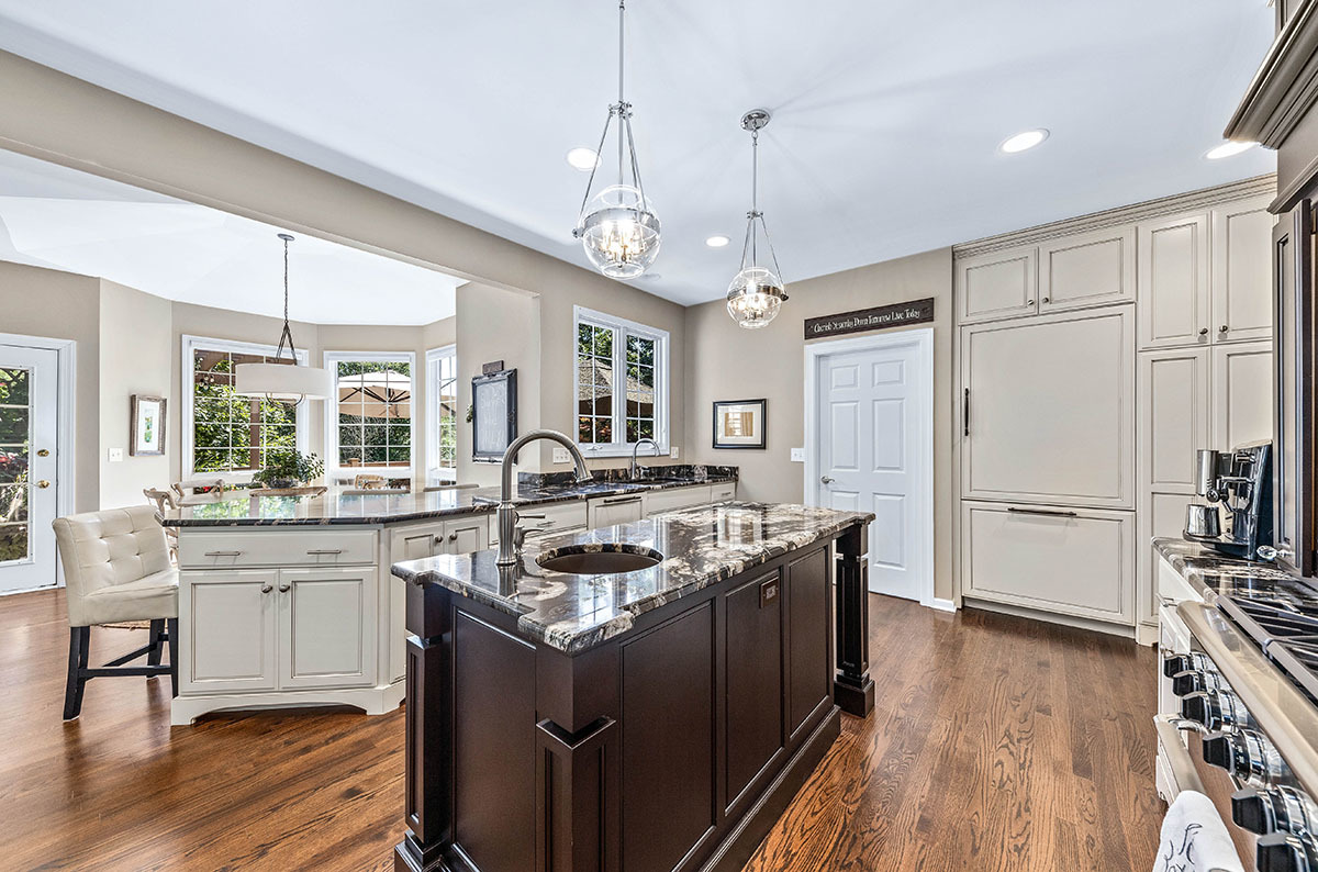 4435 Esquire Circle Naperville, IL 60564 - Photo 11 of 45 a kitchen with stainless steel appliances granite countertop a sink stove and refrigerator