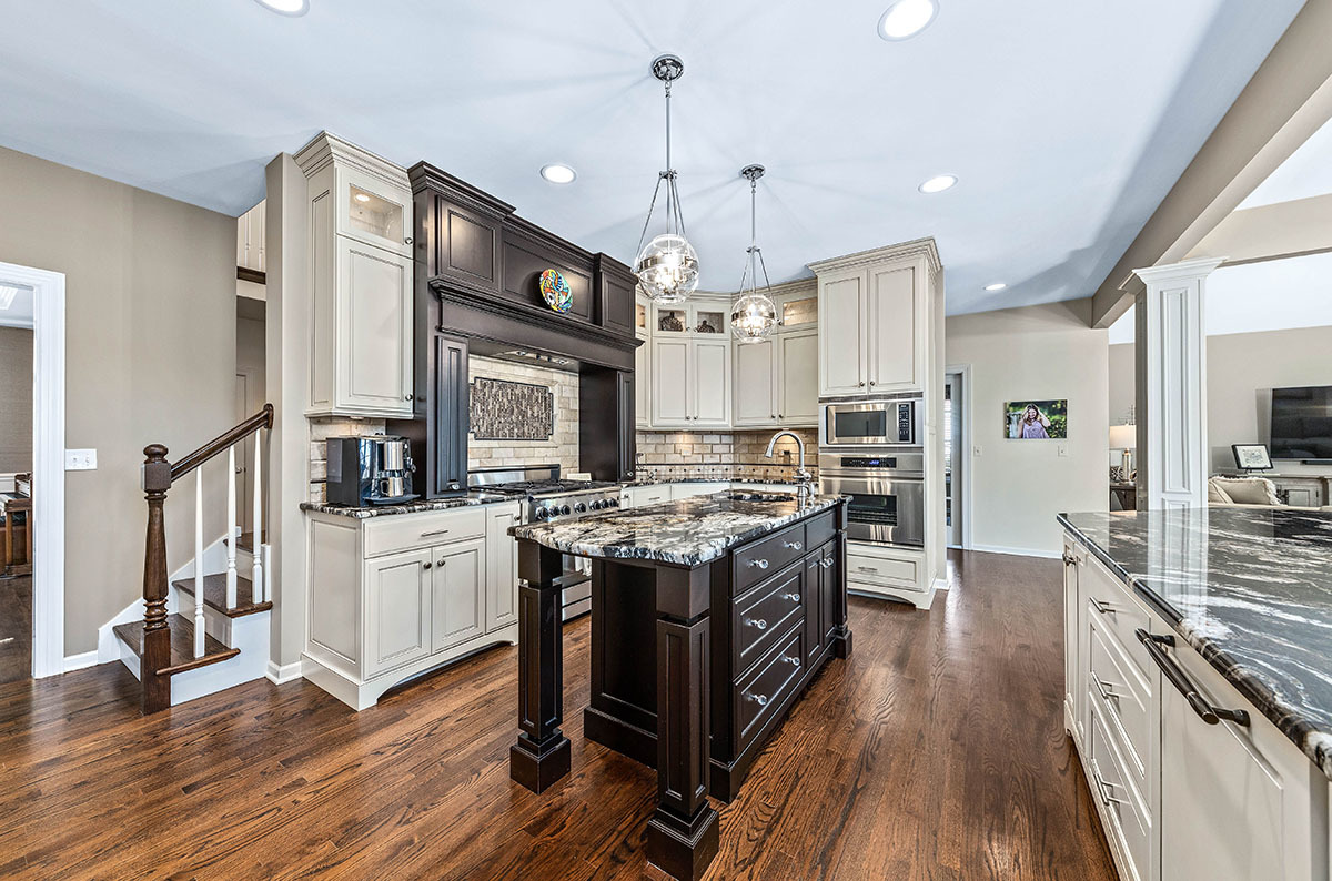 4435 Esquire Circle Naperville, IL 60564 - Photo 12 of 45 a large kitchen with stainless steel appliances a stove oven and a refrigerator