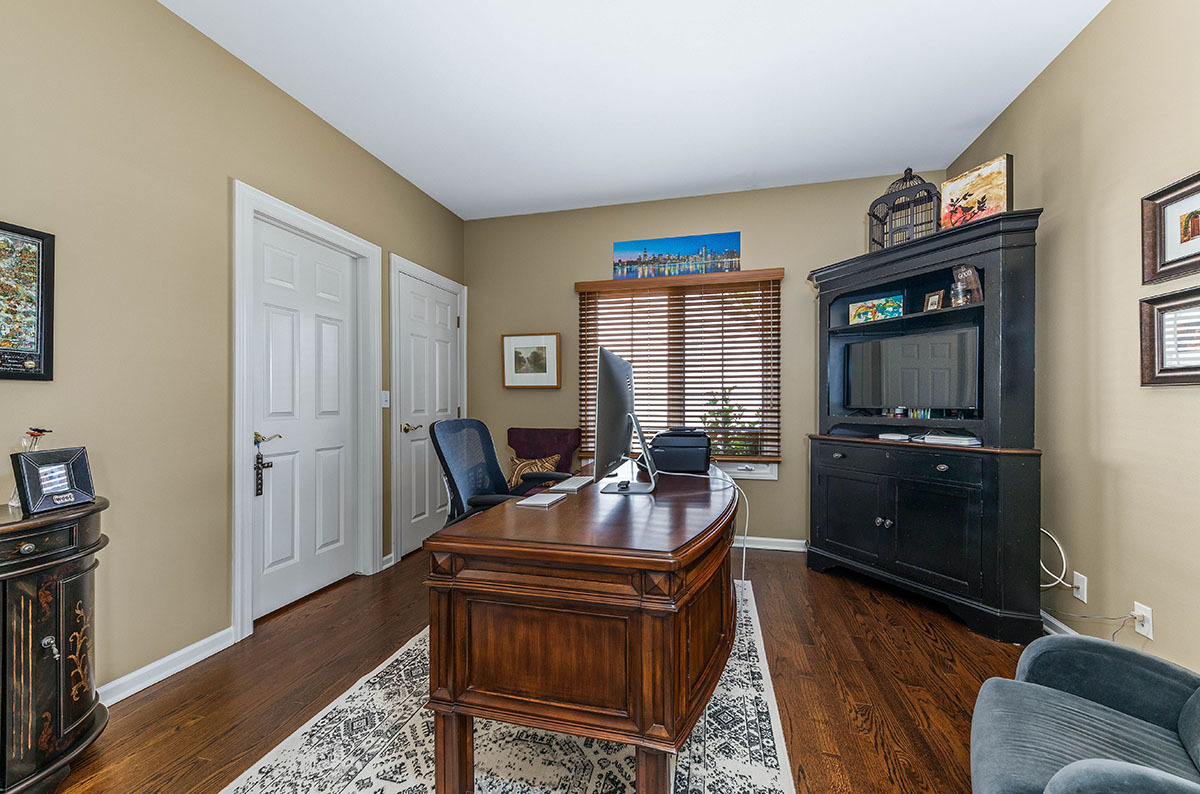 4435 Esquire Circle Naperville, IL 60564 - Photo 14 of 45 a living room with furniture and a flat screen tv