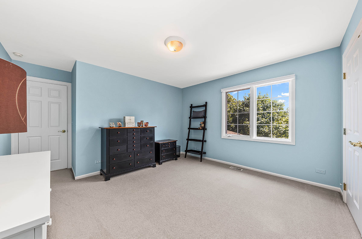4435 Esquire Circle Naperville, IL 60564 - Photo 25 of 45 a view of a livingroom with furniture and a window