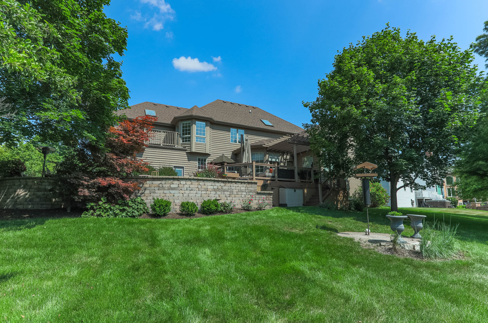 4435 Esquire Circle Naperville, IL 60564 - Photo 31 of 45 a view of a house with a yard porch and sitting area