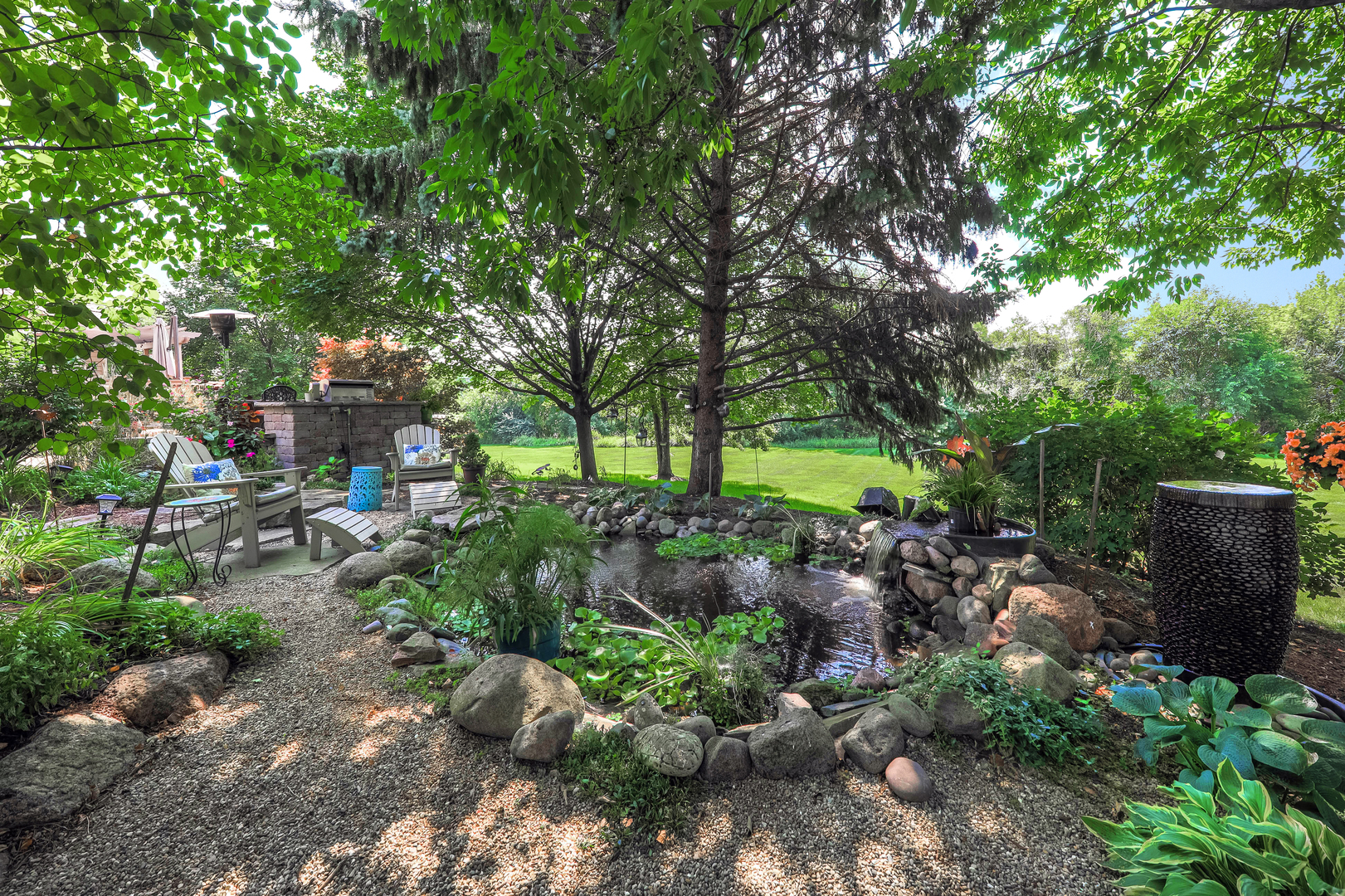 4435 Esquire Circle Naperville, IL 60564 - Photo 36 of 45 a backyard of a house with a yard and outdoor seating