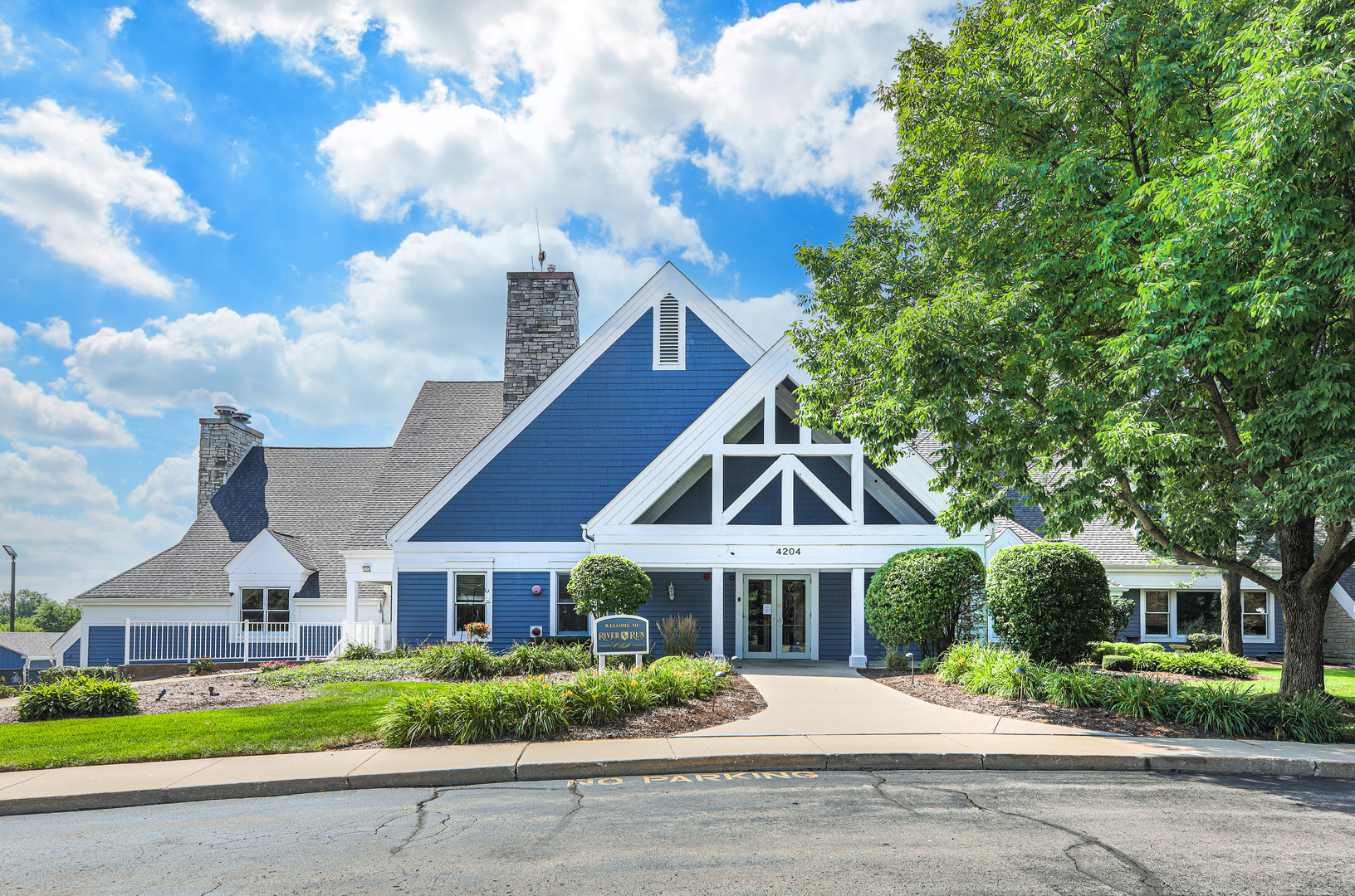 4435 Esquire Circle Naperville, IL 60564 - Photo 42 of 45 a front view of a house with a garden