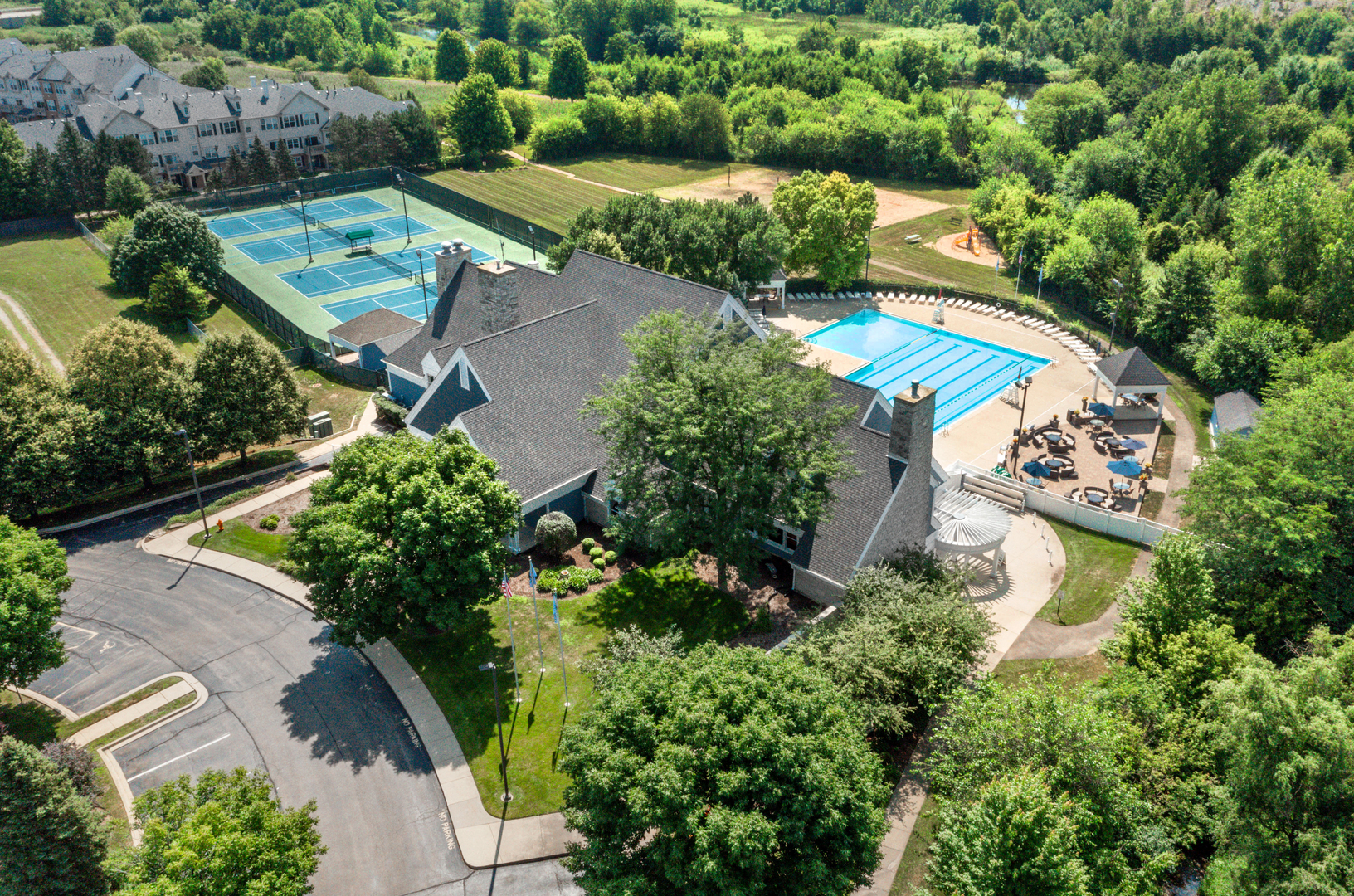 4435 Esquire Circle Naperville, IL 60564 - Photo 45 of 45 an aerial view of a house with a yard and lake view