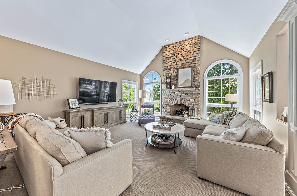 4435 Esquire Circle Naperville, IL 60564 - Photo 6 of 45 a living room with furniture fireplace and a large window