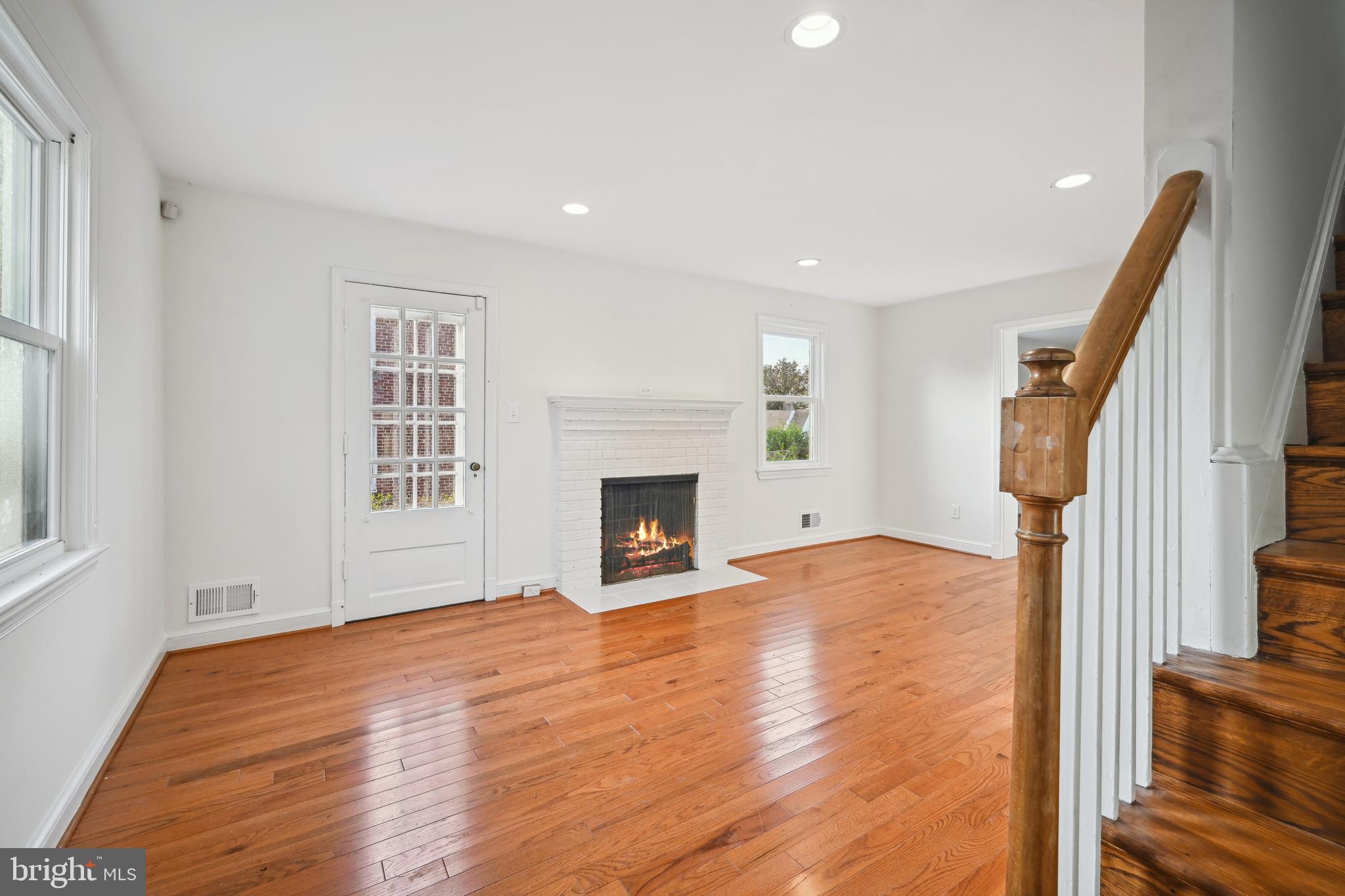 2711 Elnora Street Silver Spring, MD 20902 - Photo 4 of 25 Living Room with wood burning Fireplace