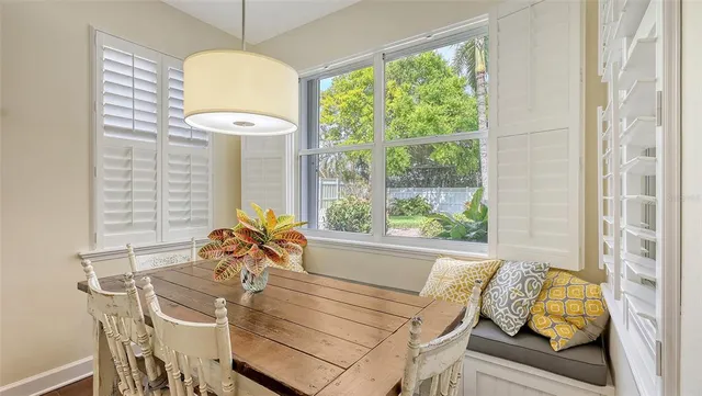 a large kitchen with stainless steel appliances kitchen island granite countertop a large center island a sink stainless steel appliances and cabinets