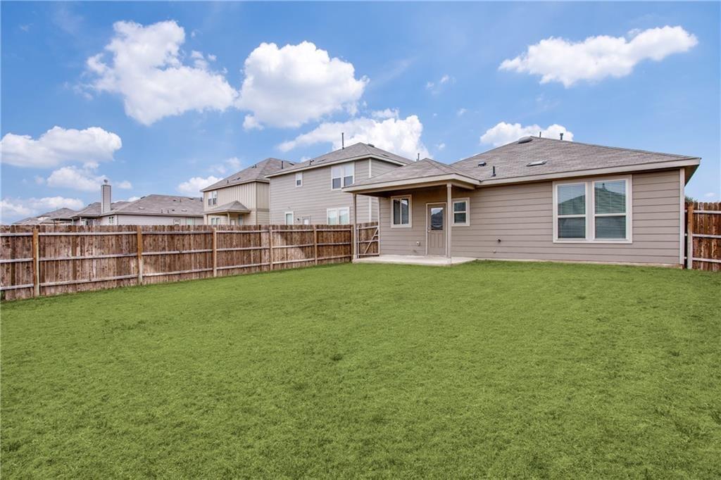 1413 Cliffbrake Way Georgetown, TX 78626 - Photo 25 of 30 a view of a house with a backyard