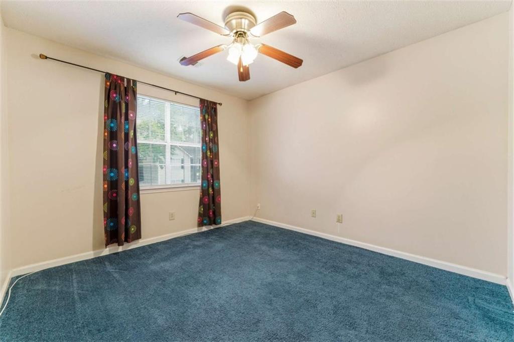6581 Coventry Point Austell, GA 30168 - Photo 11 of 20 an empty room with windows and fan