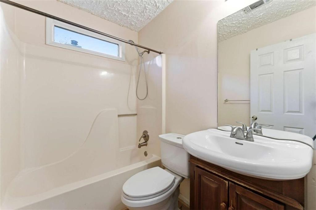 6581 Coventry Point Austell, GA 30168 - Photo 12 of 20 a bathroom with a sink toilet and shower