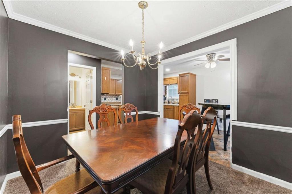 6581 Coventry Point Austell, GA 30168 - Photo 6 of 20 a dining room with furniture and window