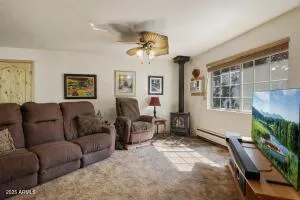 a living room with furniture and a window