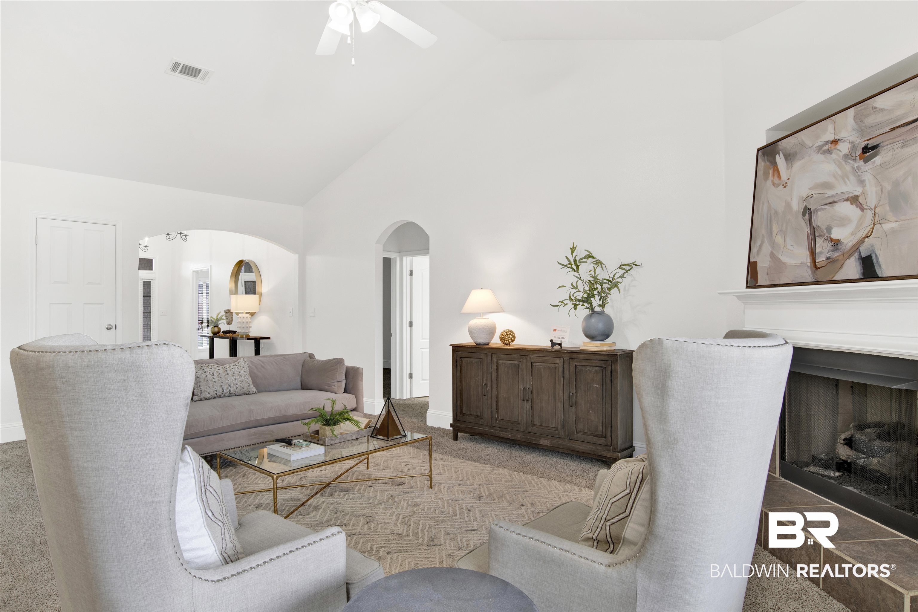 25350 Spindle Lane Daphne, AL 36526 - Photo 11 of 32 Carpeted living room with a fireplace, high vaulted ceiling, and ceiling fan