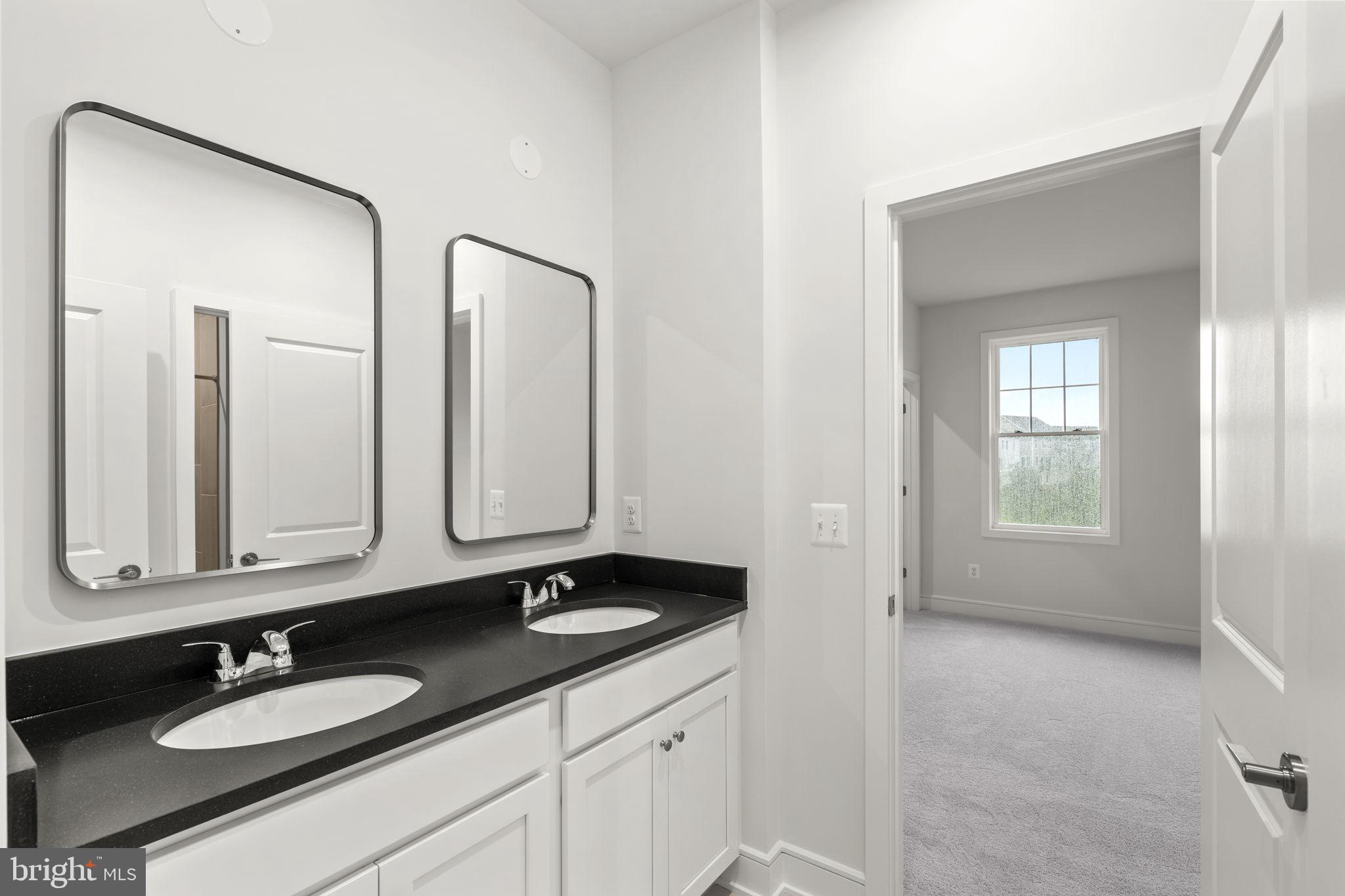2611 Blue Rdg Avenue Marshall, VA 20115 - Photo 37 of 47 a bathroom with a granite countertop sink and a mirror