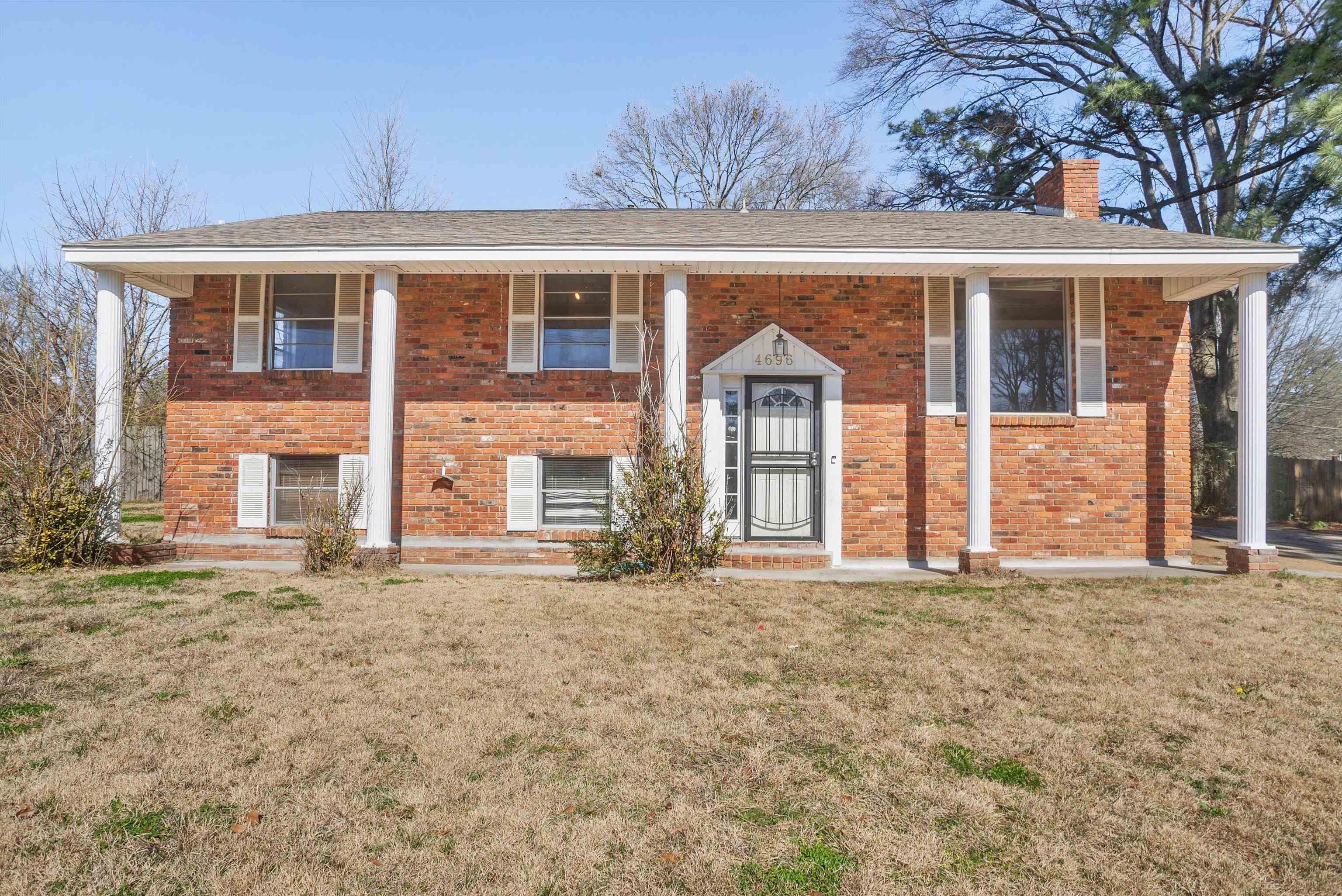 4696 Stage Road Memphis, TN 38128 - Photo 1 of 23 front view of a house with a yard