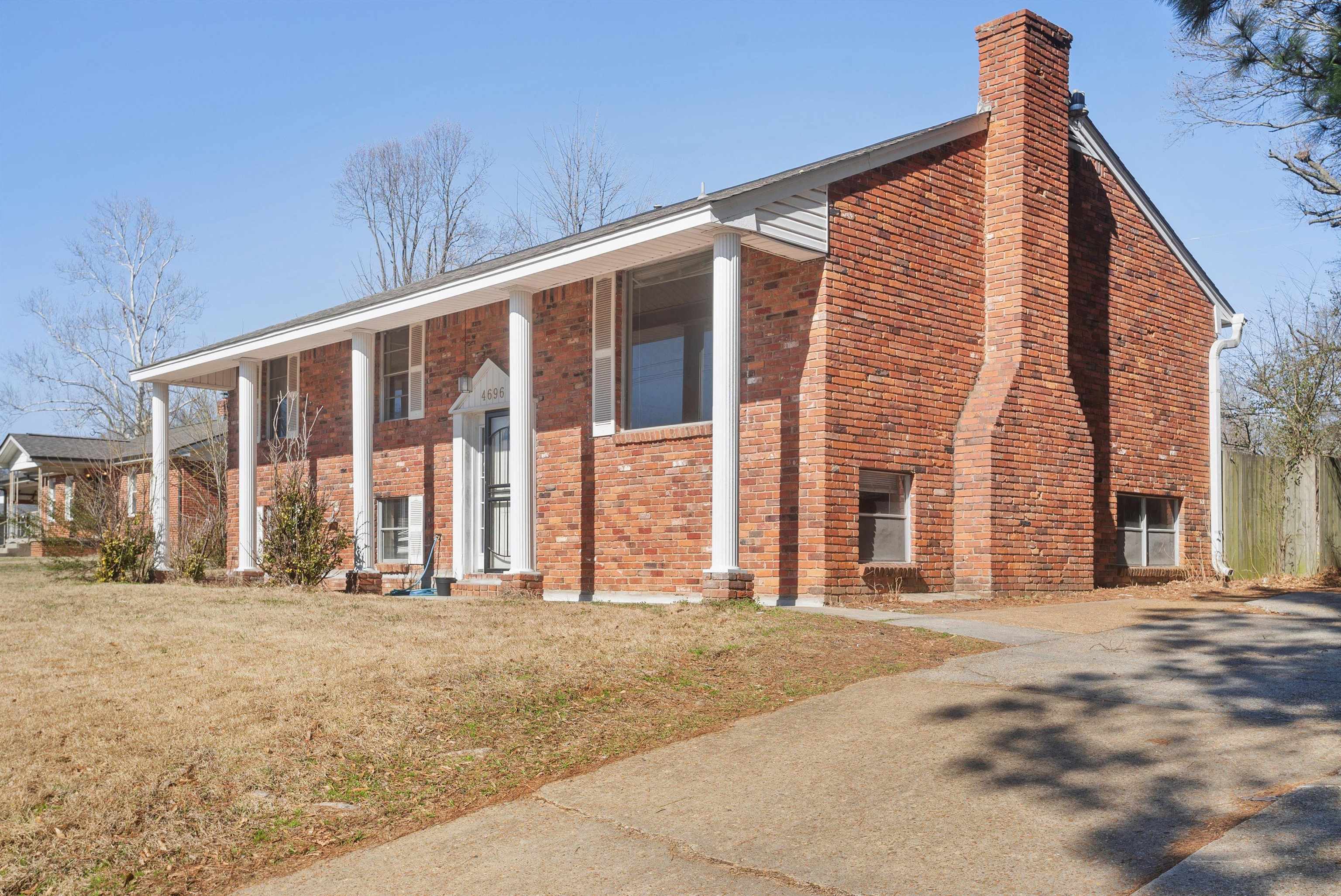 4696 Stage Road Memphis, TN 38128 - Photo 3 of 23 a front view of a building with large windows
