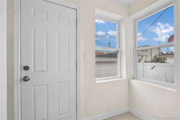 a view of a kitchen from the hallway