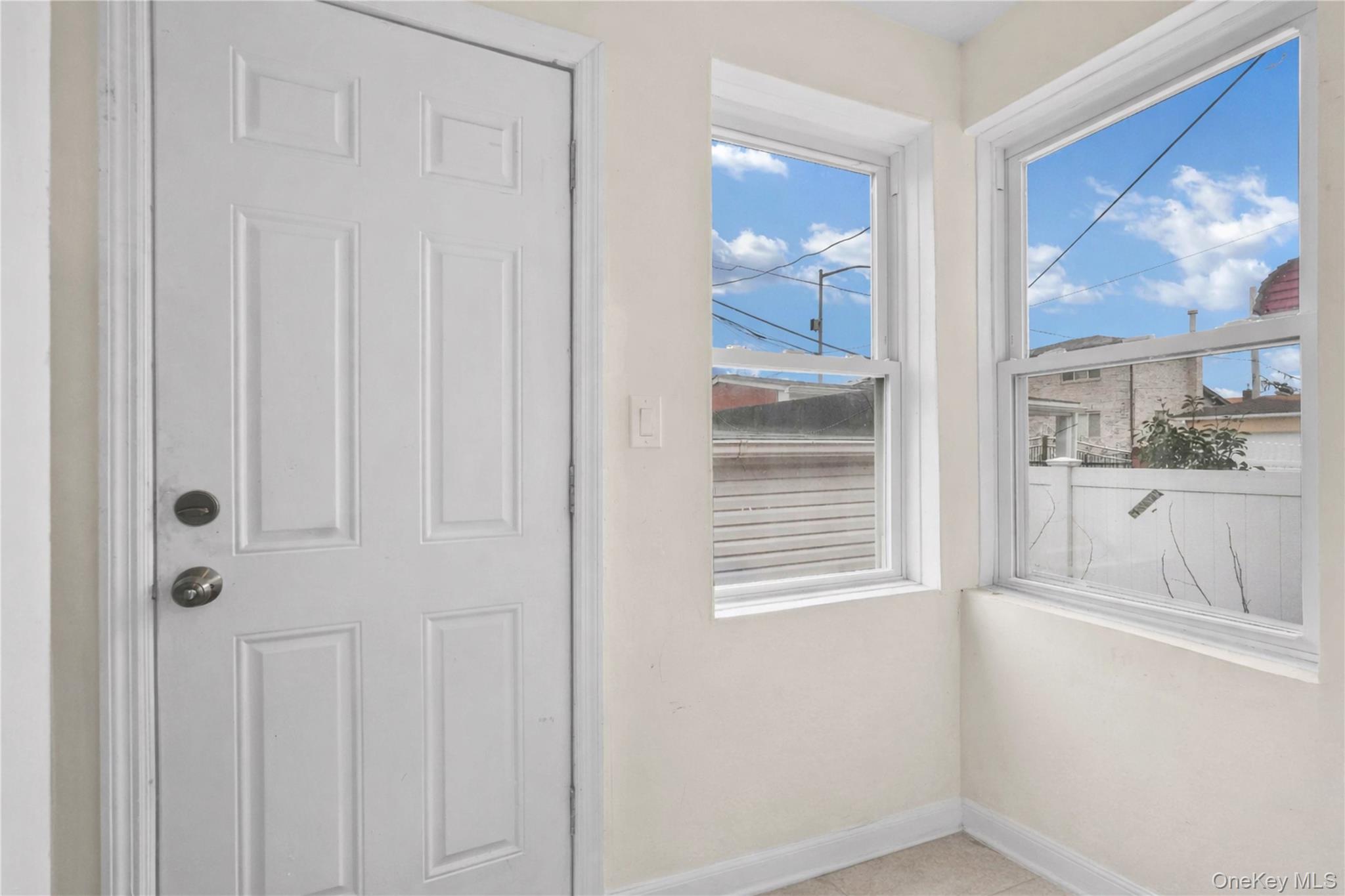 179-04 Selover Road Queens, NY 11434 - Photo 11 of 33 a view of a kitchen from the hallway