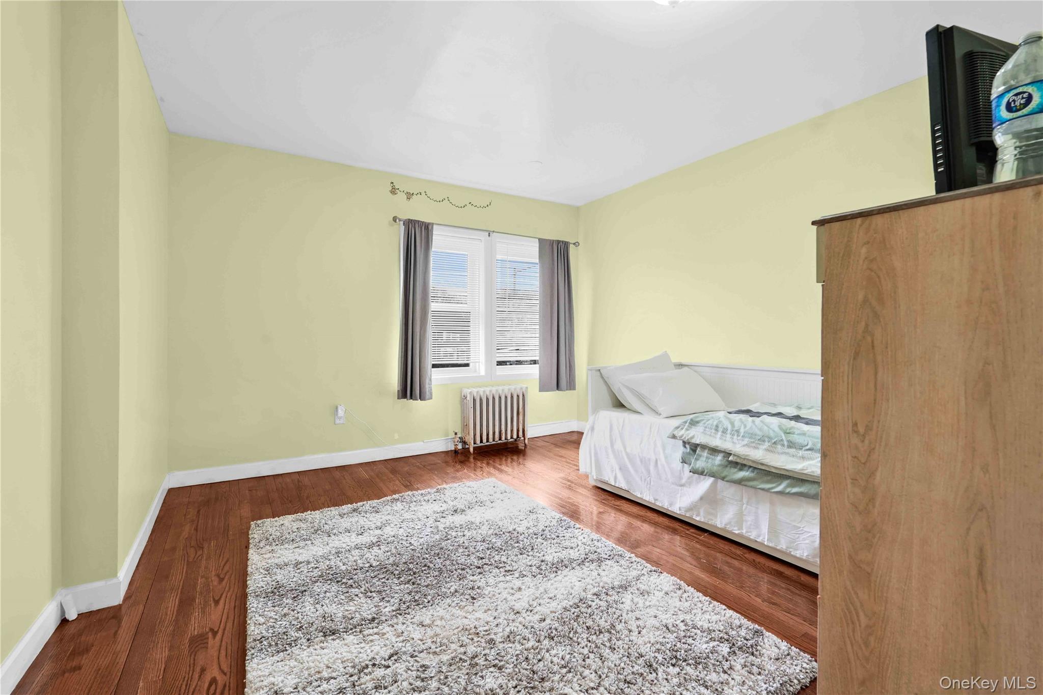 179-04 Selover Road Queens, NY 11434 - Photo 15 of 33 a living room with furniture and a table