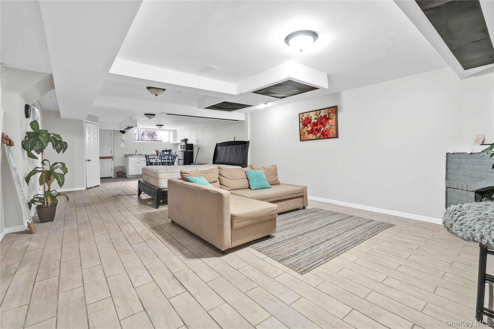 179-04 Selover Road Queens, NY 11434 - Photo 21 of 33 a living room with furniture and a couch