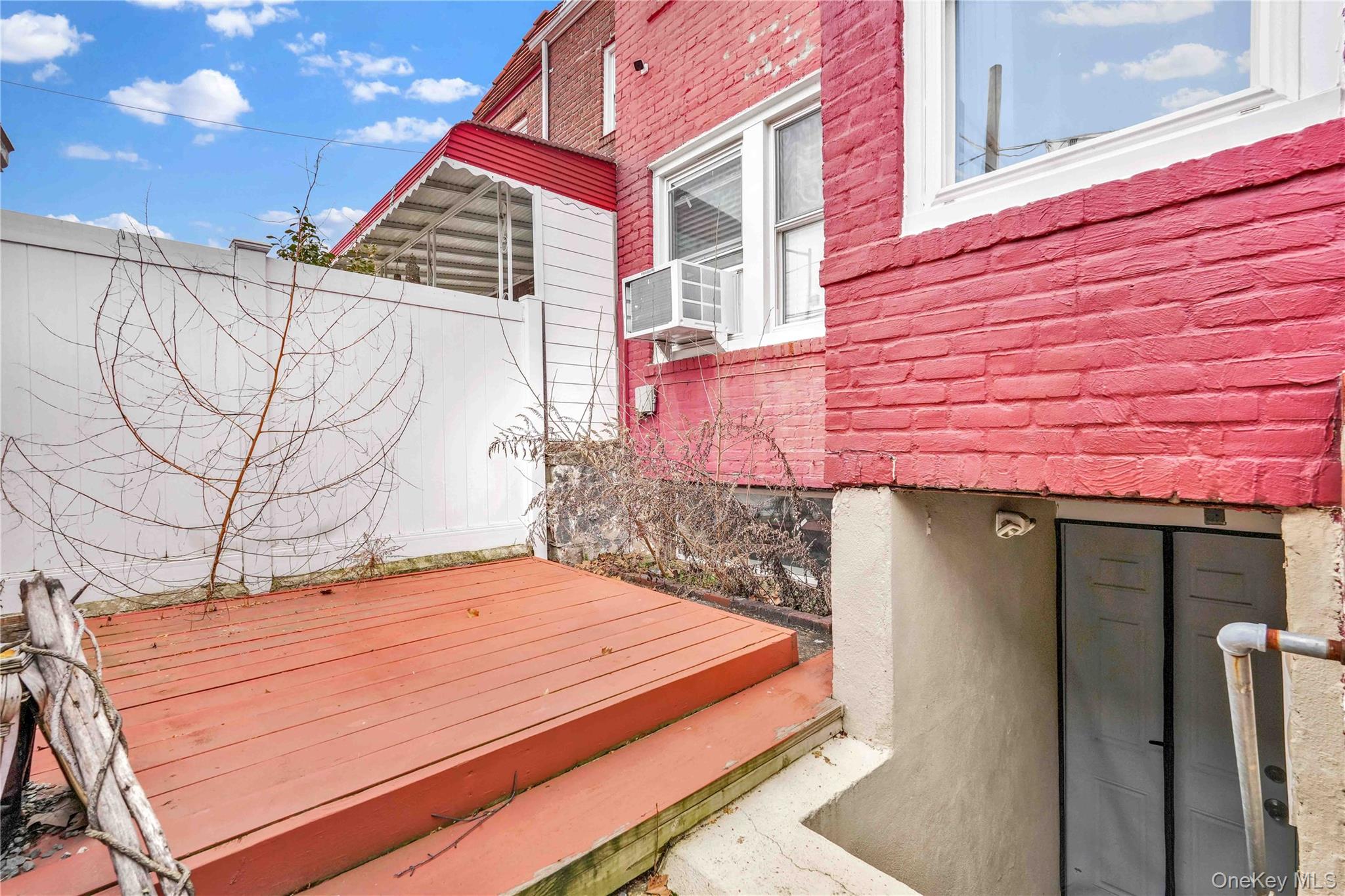 179-04 Selover Road Queens, NY 11434 - Photo 31 of 33 a view of a backyard with a wooden fence