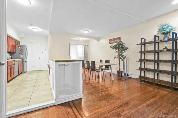 a view of a living room and dining room