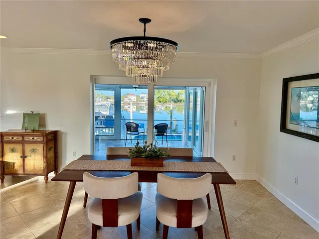 a large kitchen with a stove a sink dishwasher a refrigerator and a stove