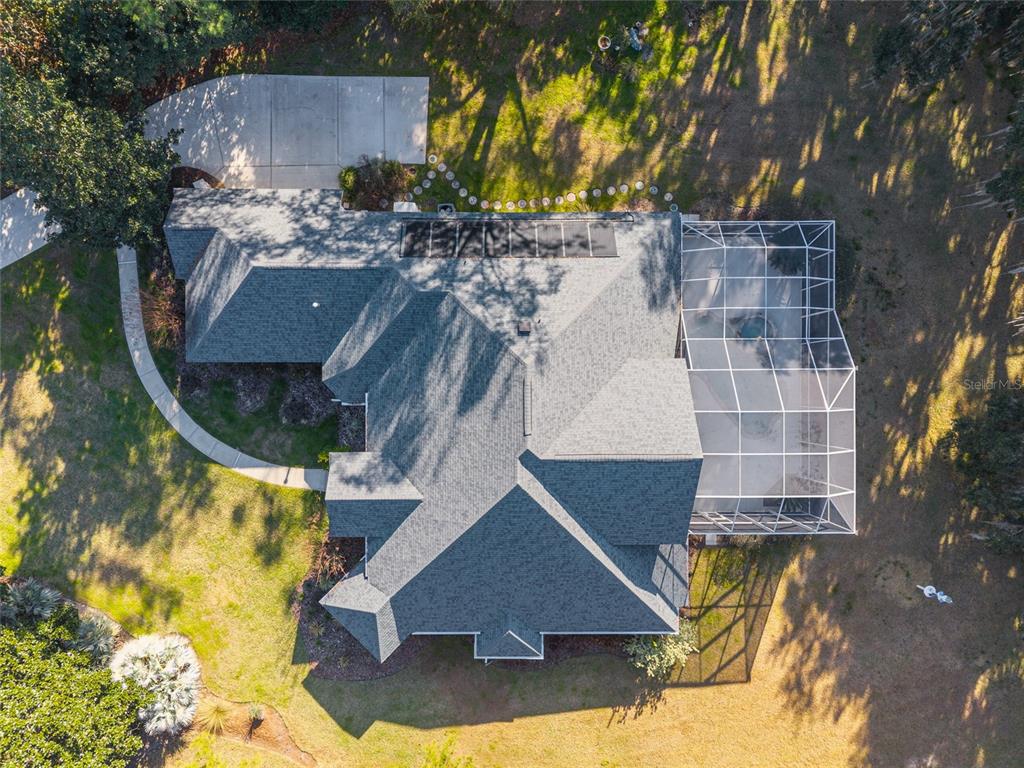 10614 Southwest 15th Lane Gainesville, FL 32607 - Photo 80 of 85 an aerial view of a house with a yard and large trees